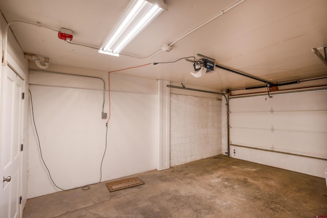 garage featuring a garage door opener