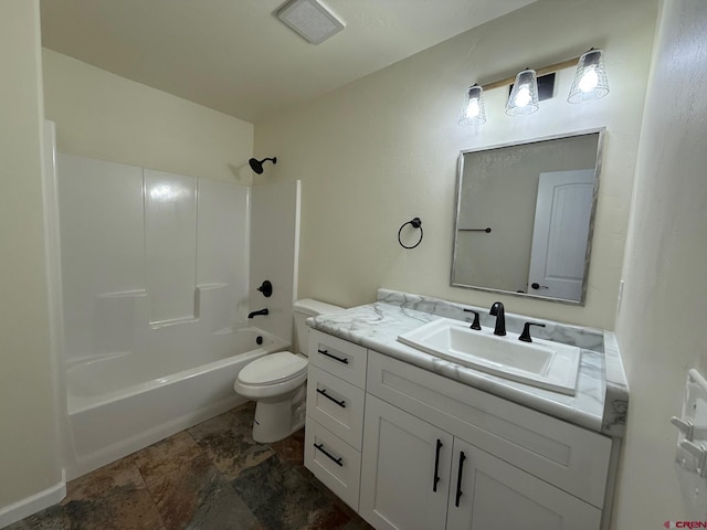 full bathroom with toilet, vanity, and  shower combination