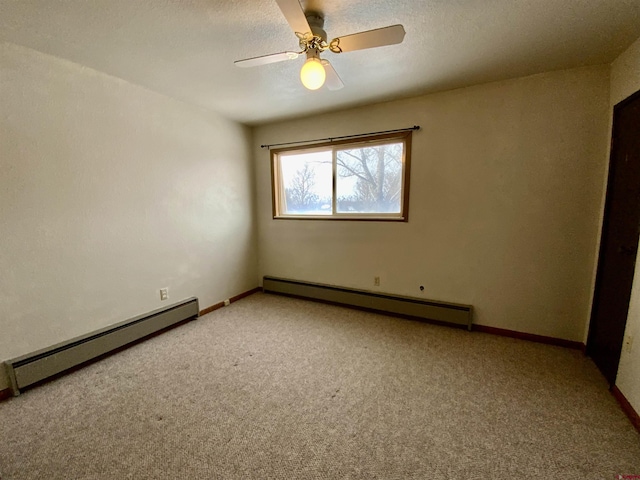 empty room with baseboard heating, ceiling fan, and carpet flooring