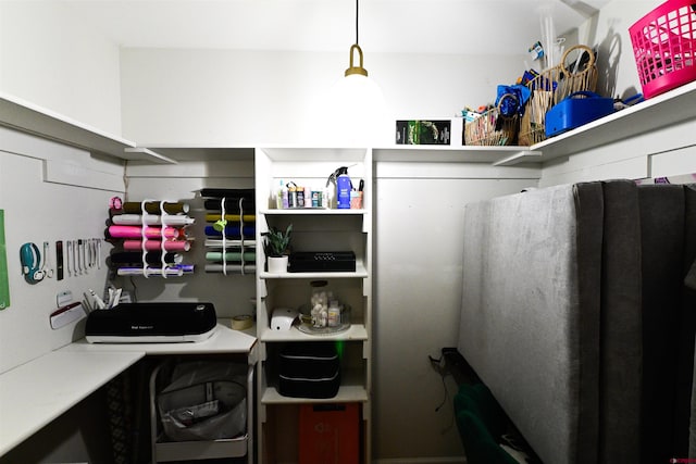 interior space with hanging light fixtures