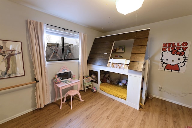 bedroom featuring light wood-type flooring