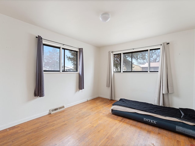 unfurnished bedroom featuring light hardwood / wood-style flooring