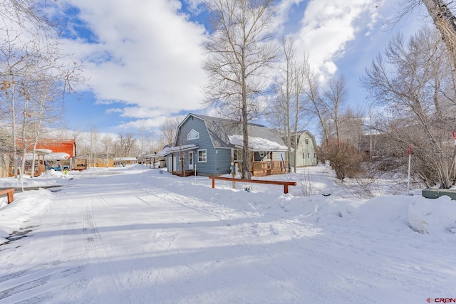 view of snow covered property