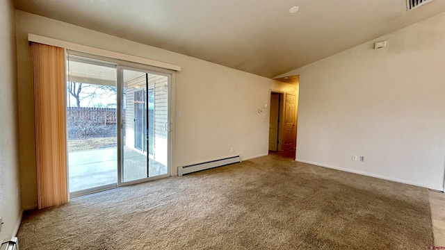 carpeted empty room featuring lofted ceiling and baseboard heating