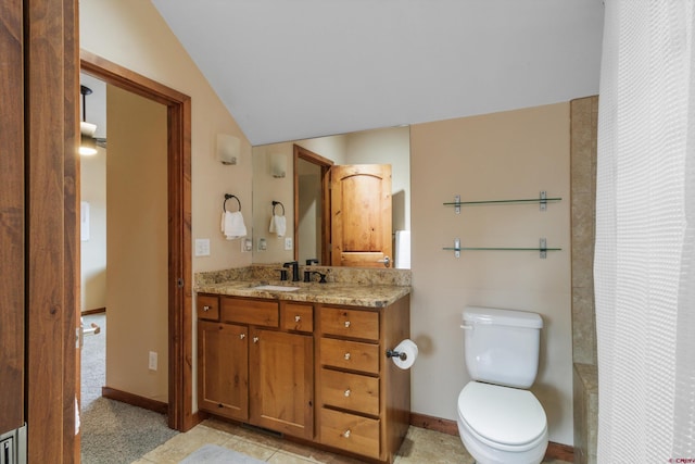 bathroom with vanity, toilet, walk in shower, and lofted ceiling