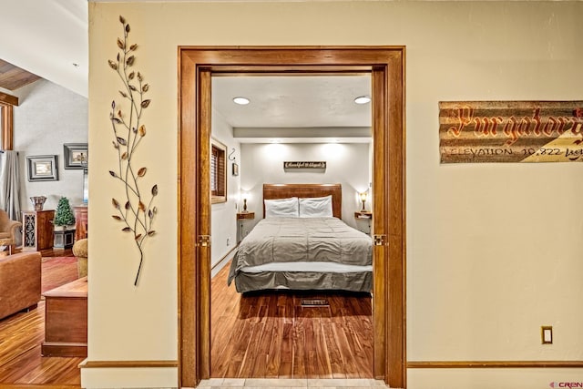 bedroom featuring lofted ceiling