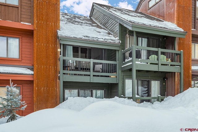 view of snow covered property