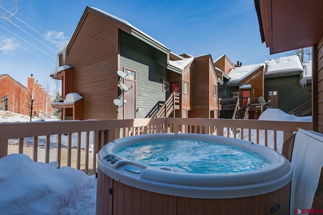 view of snow covered deck