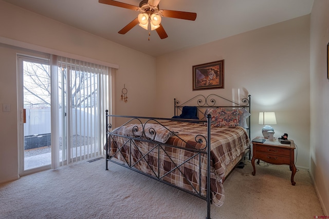 bedroom featuring access to exterior, carpet, and ceiling fan