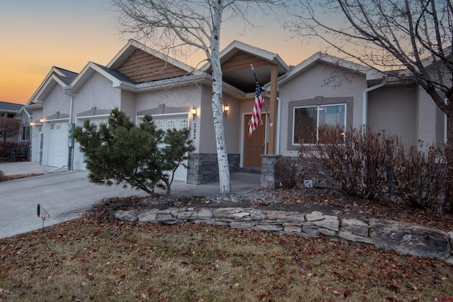 ranch-style home with a garage