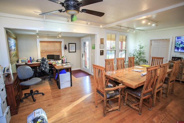 dining room with wood-type flooring and ceiling fan