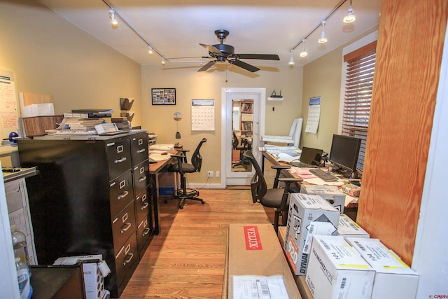 home office with ceiling fan and light wood-type flooring