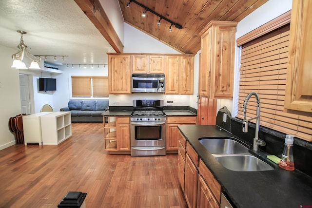 kitchen with wood ceiling, stainless steel appliances, sink, a chandelier, and hardwood / wood-style floors