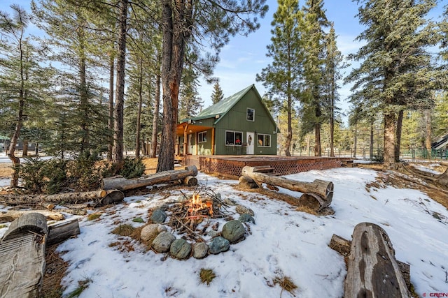 exterior space with a fire pit