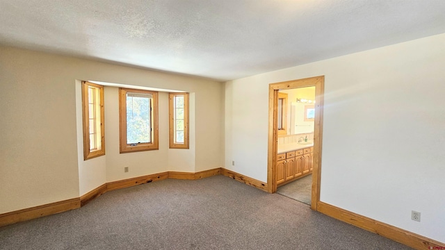 unfurnished room with light colored carpet