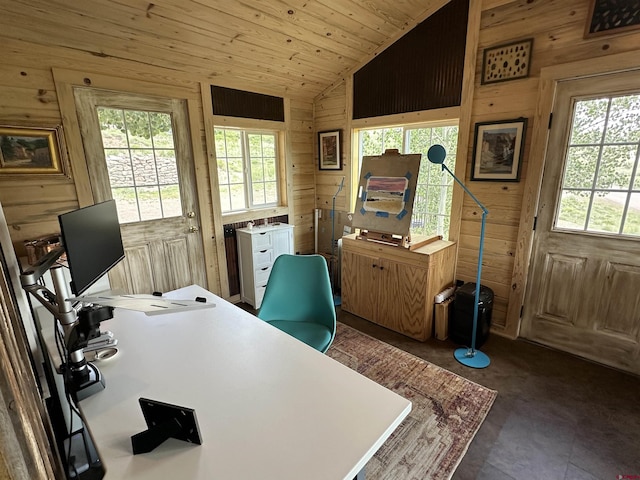 office area with wood walls, wooden ceiling, and vaulted ceiling