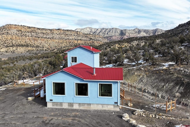 exterior space featuring a mountain view