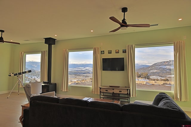 living room with ceiling fan