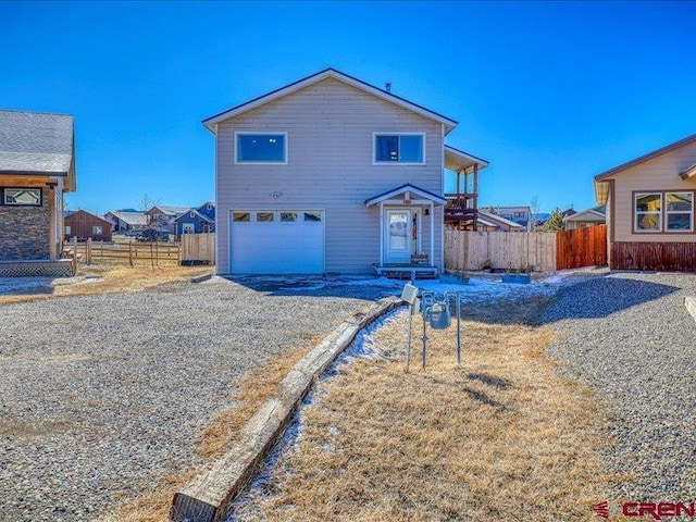 view of front of property featuring a garage