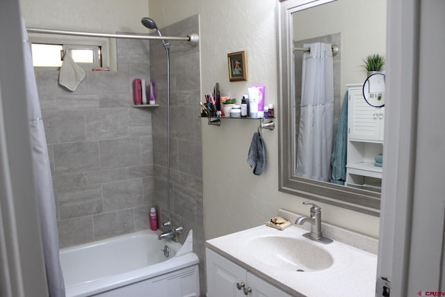 bathroom featuring shower / bath combination with curtain and vanity