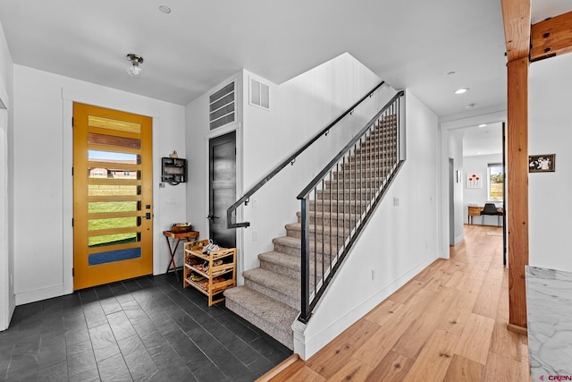 foyer with wood-type flooring