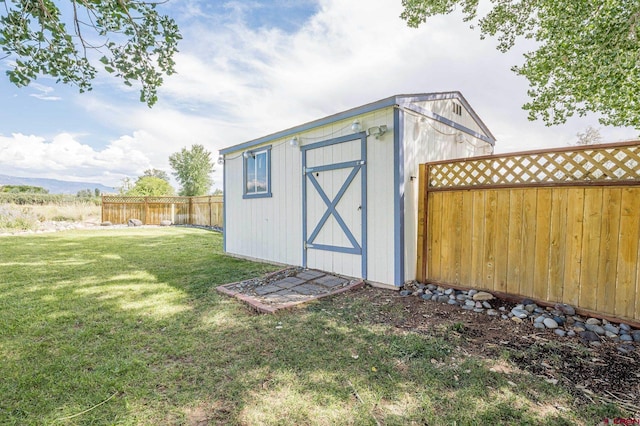 view of outdoor structure with a yard