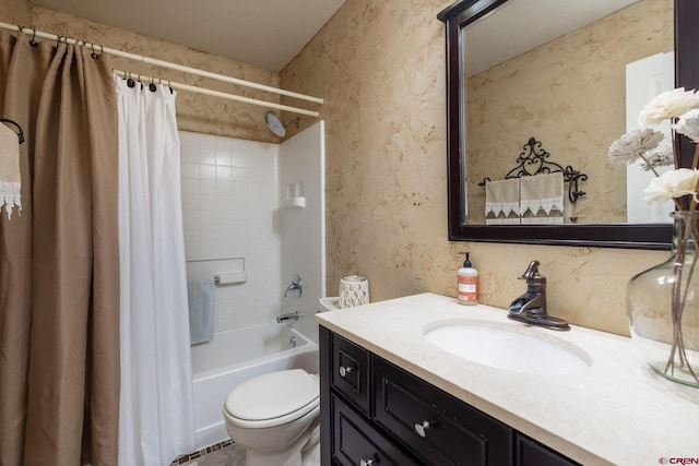 full bathroom featuring vanity, toilet, and shower / bath combo with shower curtain