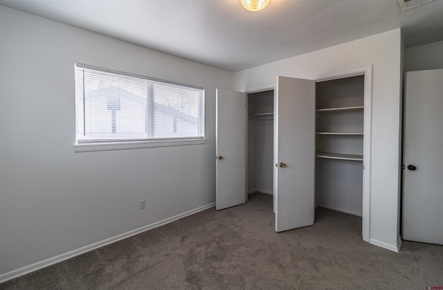 unfurnished bedroom with carpet flooring