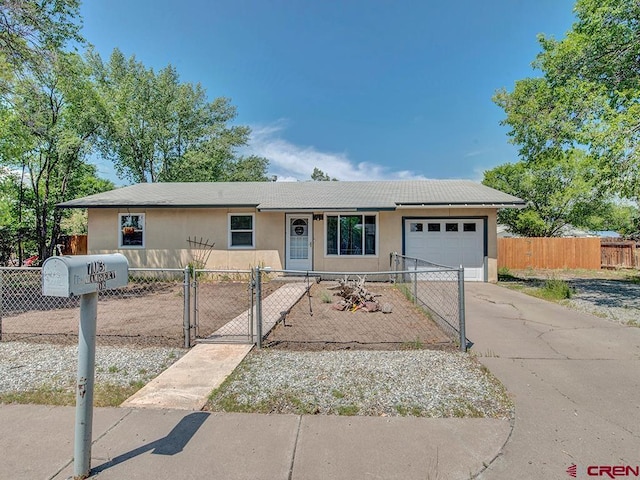 ranch-style home with a garage