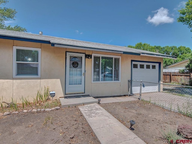 view of front of home featuring a garage