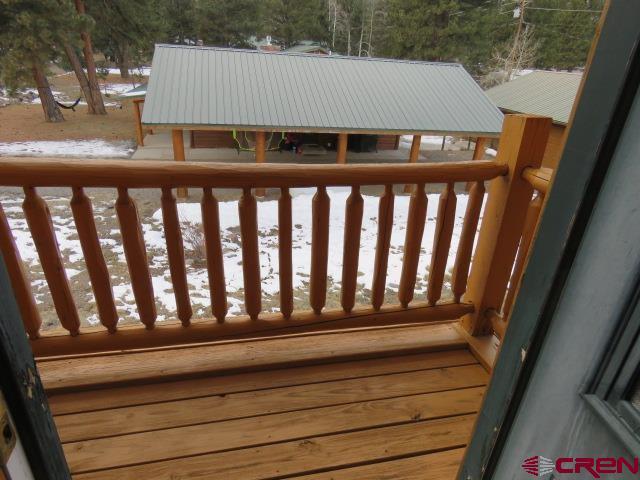 view of snow covered deck