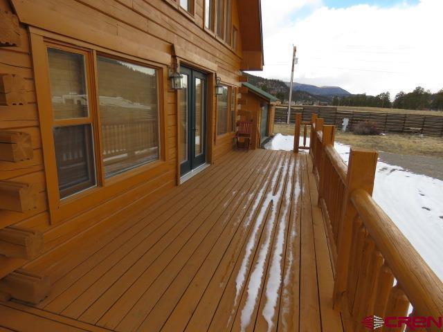 view of snow covered deck