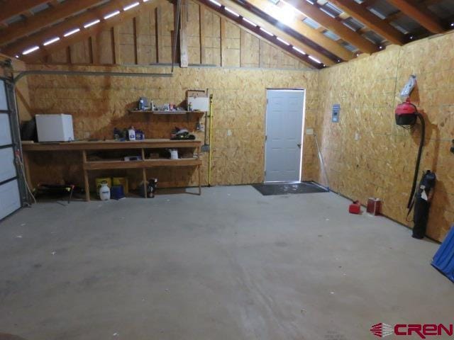 garage with a workshop area