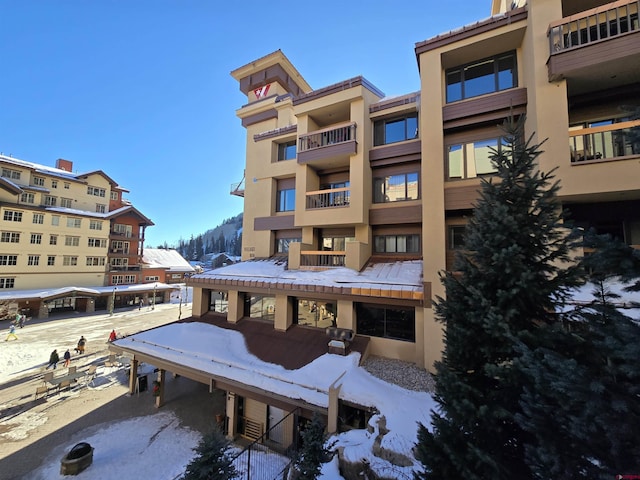 view of snow covered building