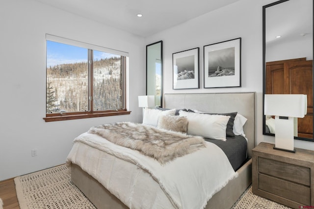 bedroom featuring light wood-type flooring