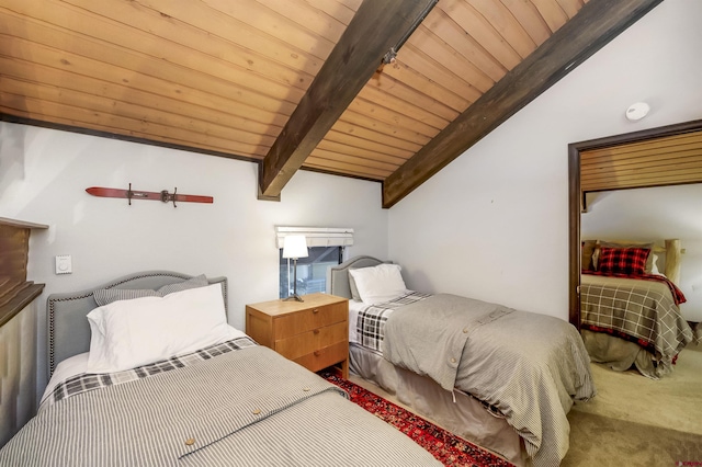 carpeted bedroom with lofted ceiling with beams and wooden ceiling