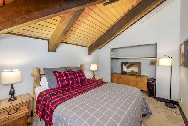 bedroom featuring carpet flooring, lofted ceiling with beams, wooden ceiling, and a closet