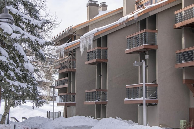 view of snow covered building