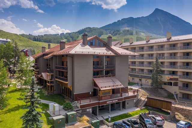 view of building exterior featuring a mountain view