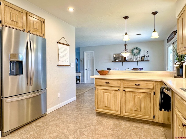 kitchen with kitchen peninsula, light brown cabinetry, decorative light fixtures, and appliances with stainless steel finishes