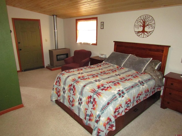 carpeted bedroom featuring wood ceiling and lofted ceiling