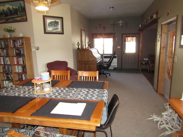 view of carpeted dining space