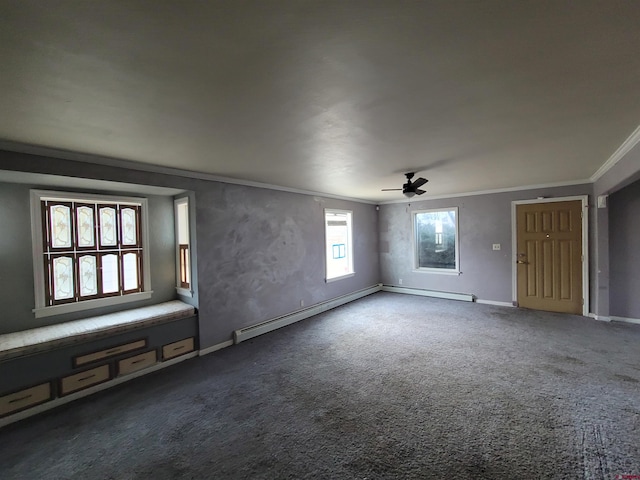 interior space with ceiling fan, ornamental molding, and a baseboard heating unit