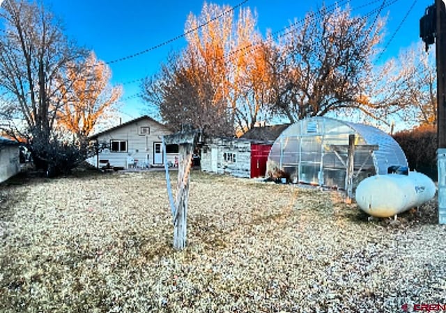 exterior space featuring an outdoor structure