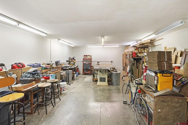 garage with a workshop area