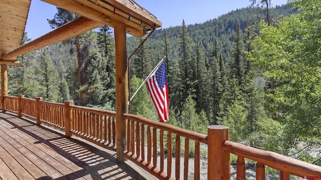 wooden terrace with a mountain view