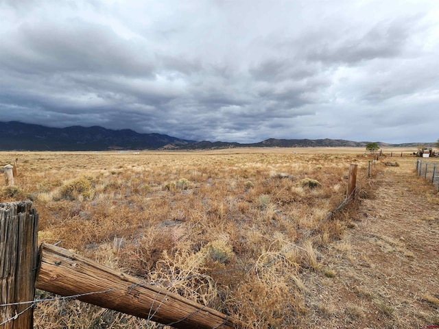 view of mountain feature with a rural view