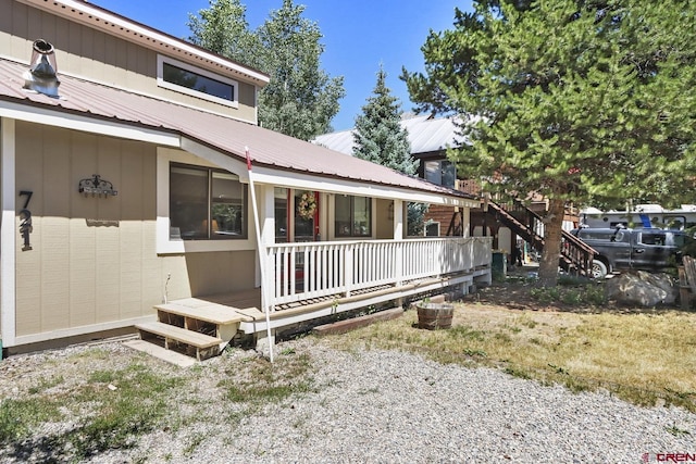 exterior space featuring covered porch