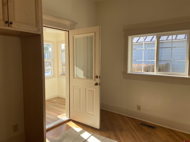 doorway to outside featuring light hardwood / wood-style flooring