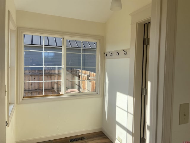 spare room featuring hardwood / wood-style flooring